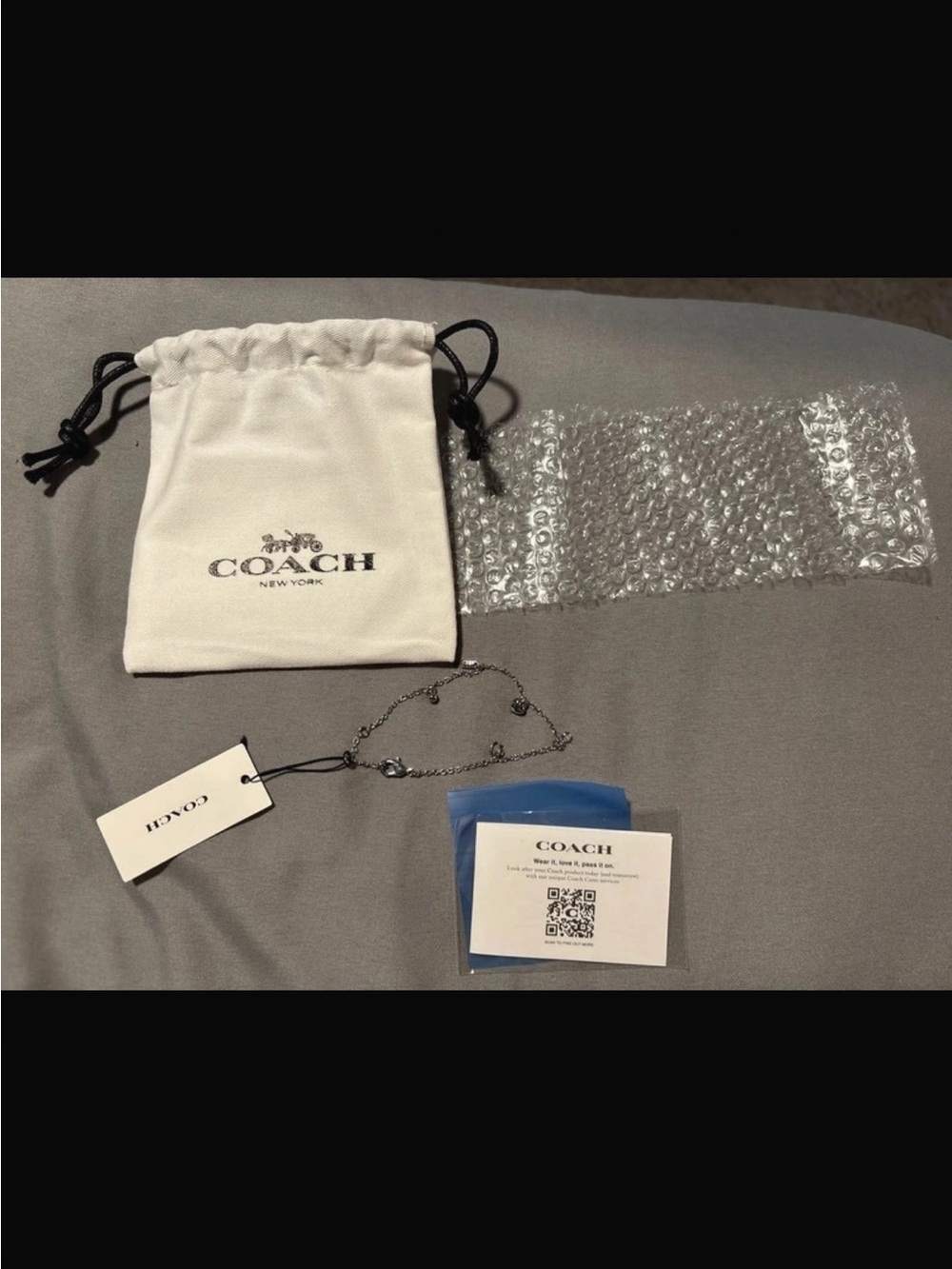 Coach Silver-Tone Heart Charm Bracelet with Branded Drawstring Pouch - Silver